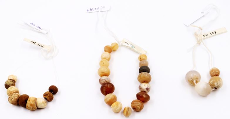 Carnelian + Chalk beads used as necklaces