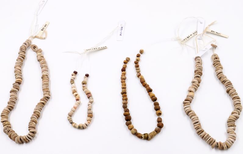 Four Brown beads used as necklaces