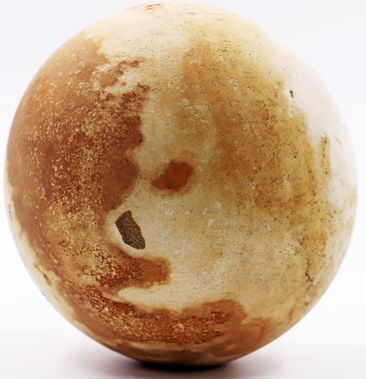 Fossilized ostrich egg used as a container for storing liquids