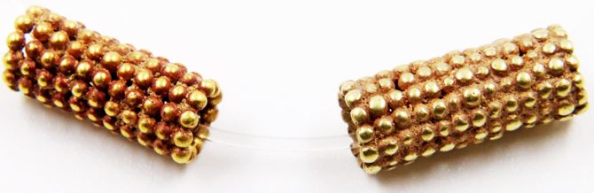 Two golden beads
