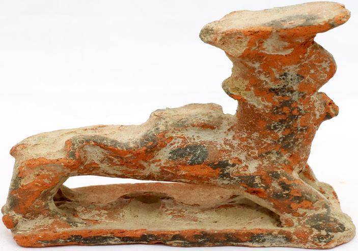 Animal figure (camel?) carrying snakes (pottery)